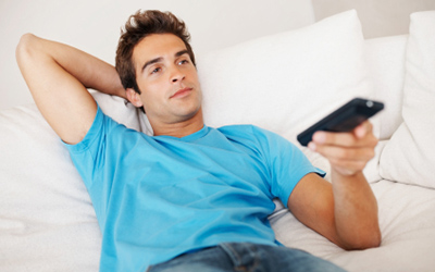 Person Lounging On Their Couch