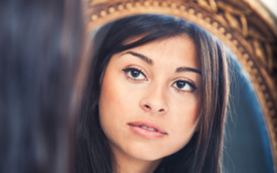 Female Student Looking Reflective
